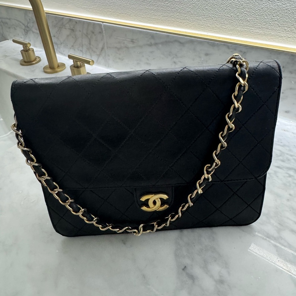 CHANEL vintage gold plated black lamb skin single flap bag